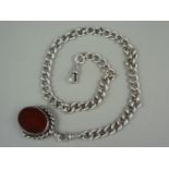 A Victorian gentleman's silver Albert watch chain, with swivel and fob seal, the latter set with