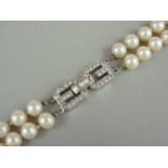 A vintage Givenchy costume jewellery faux pearl necklace, with two strands of uniform pearls