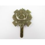An HLI other rank's pagri badge bearing Gaunt London plaque