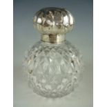 A Victorian uncommonly large silver mounted and cut-glass grenade form perfume bottle, with ground-