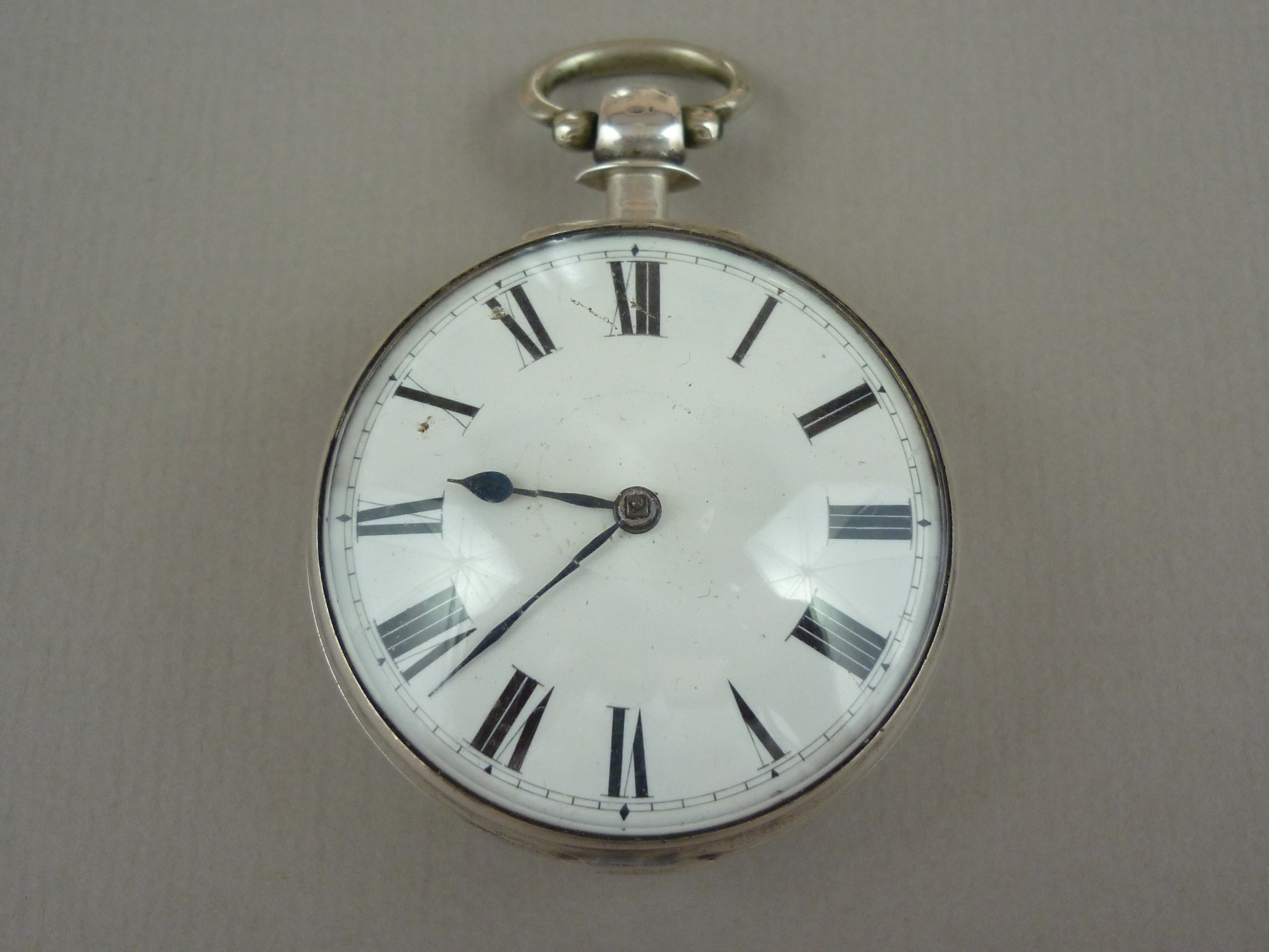 A George III silver cased pocket watch by J White of London, having verge movement, white