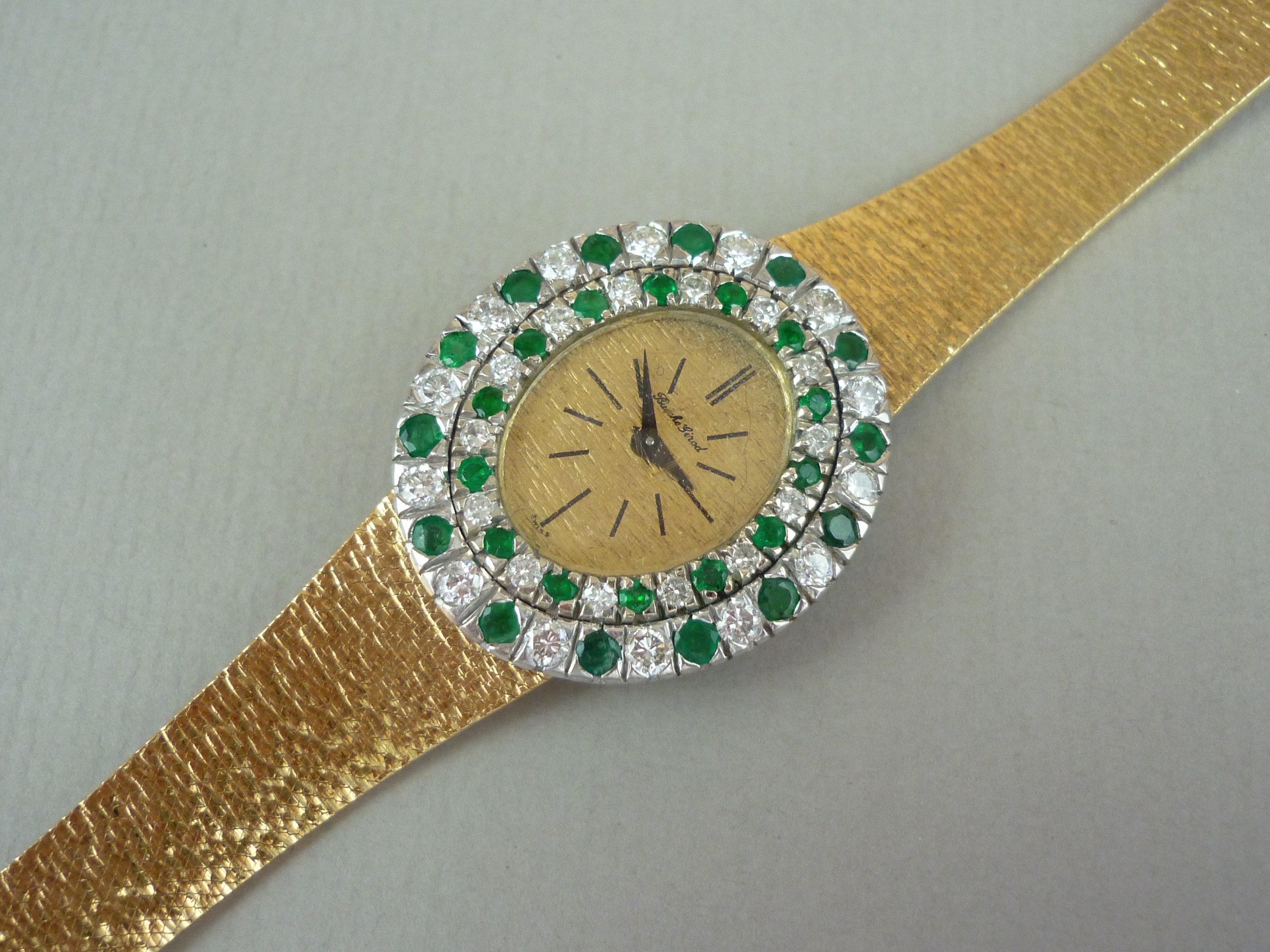 A vintage Bueche Ginod 18ct gold, diamond and emerald cocktail watch, having a mechanical - Image 2 of 3