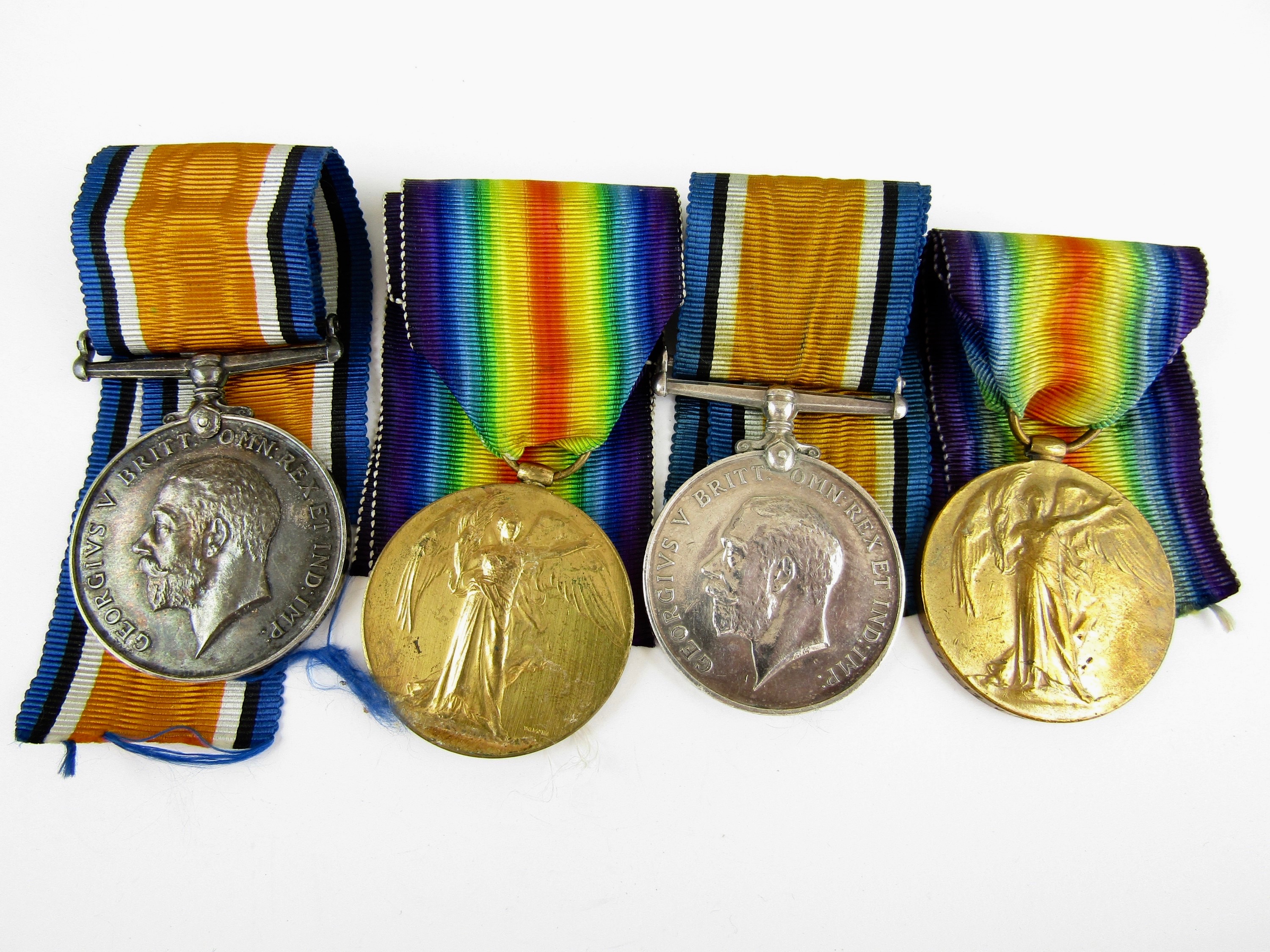 British War and Victory Medal pairs respectively to J75217 V R Cook, RN and 110723 A Cpl W