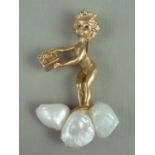 A vintage high-carat yellow metal, baroque pearl and sapphire 'Monday's Child' brooch designed by