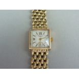 A vintage Baume and Mercier 18ct gold wristlet watch, with mechanical movement, square silvered
