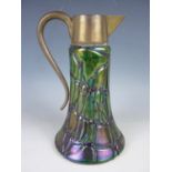 A 19th Century Loetz type green lustre glass claret jug, with iridescent trailing decoration, 25