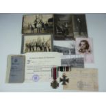 An Imperial German medal and document group, comprising Iron Cross Second Class and Honour Cross,