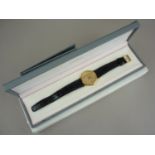 An Omega 18ct gold cased wristwatch, having quartz movement, circular face, brushed dial, baton