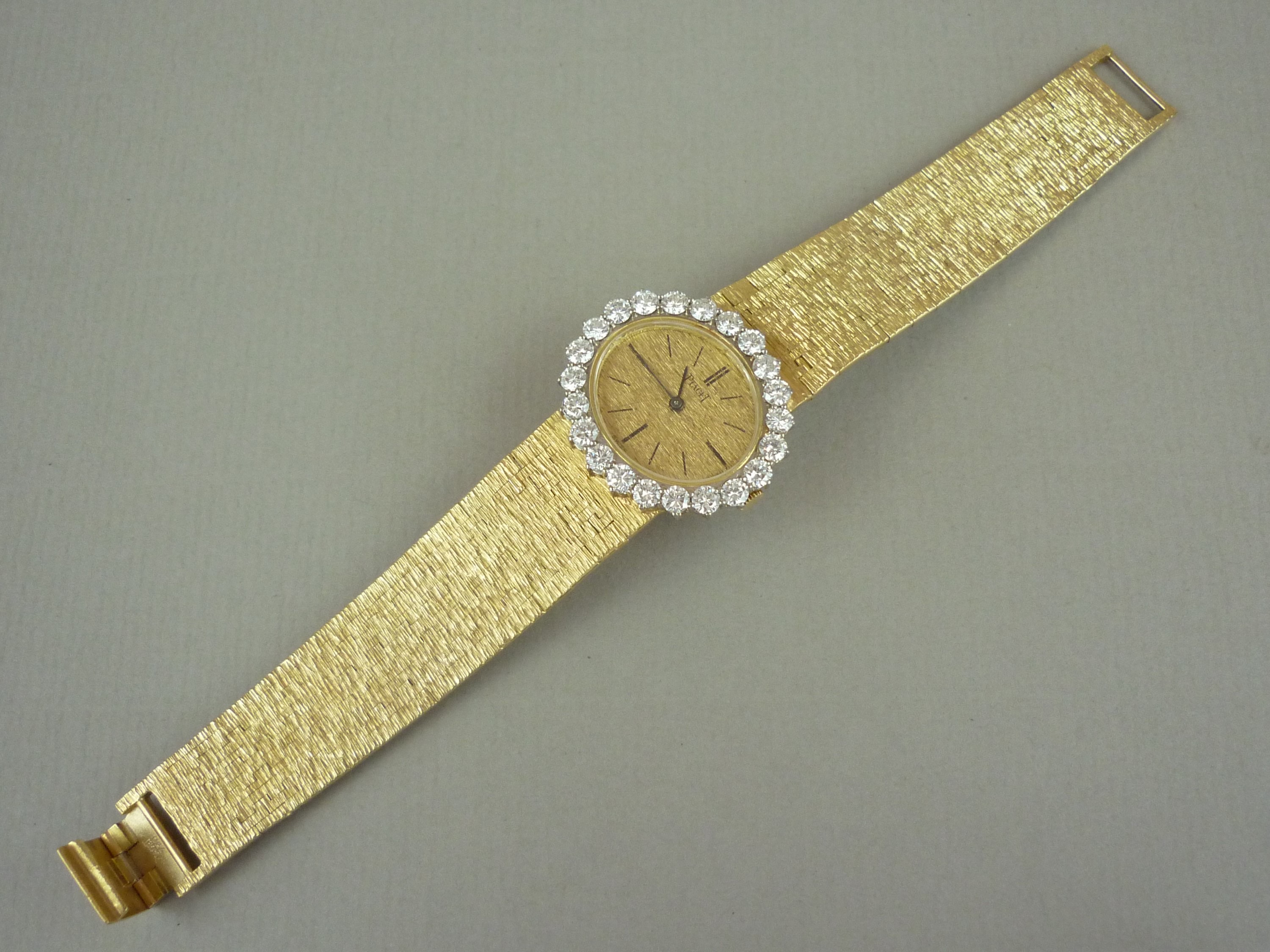 A Piaget 18ct gold and diamond cocktail watch, having crown wound movement, textured oval face - Image 3 of 3