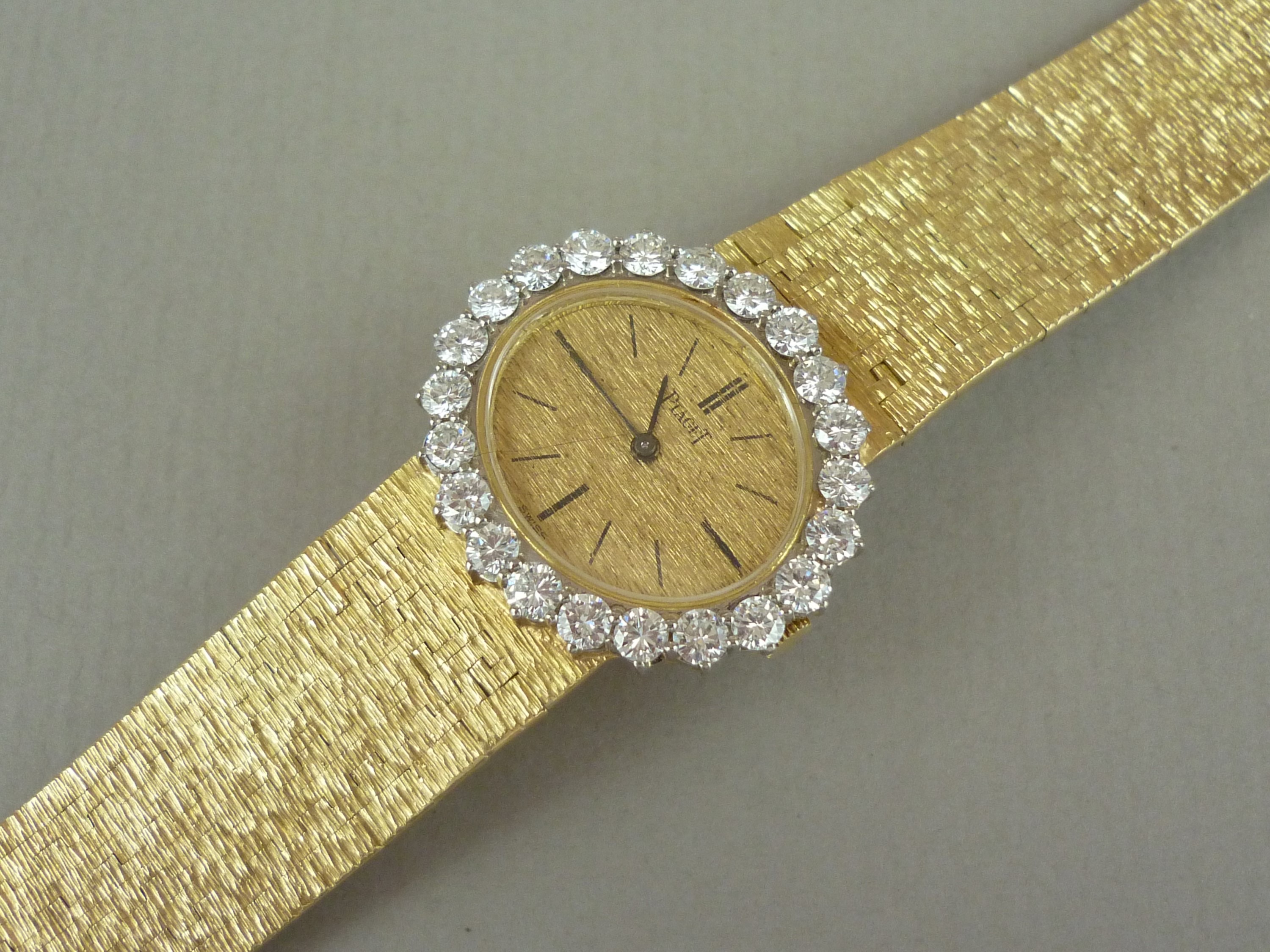 A Piaget 18ct gold and diamond cocktail watch, having crown wound movement, textured oval face - Image 2 of 3