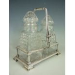 A late 19th / early 20th Century cut glass pickle jars and electroplate stand, 22 cm