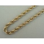 A high carat yellow metal rope link neck chain, stamped 14K, 23.7g