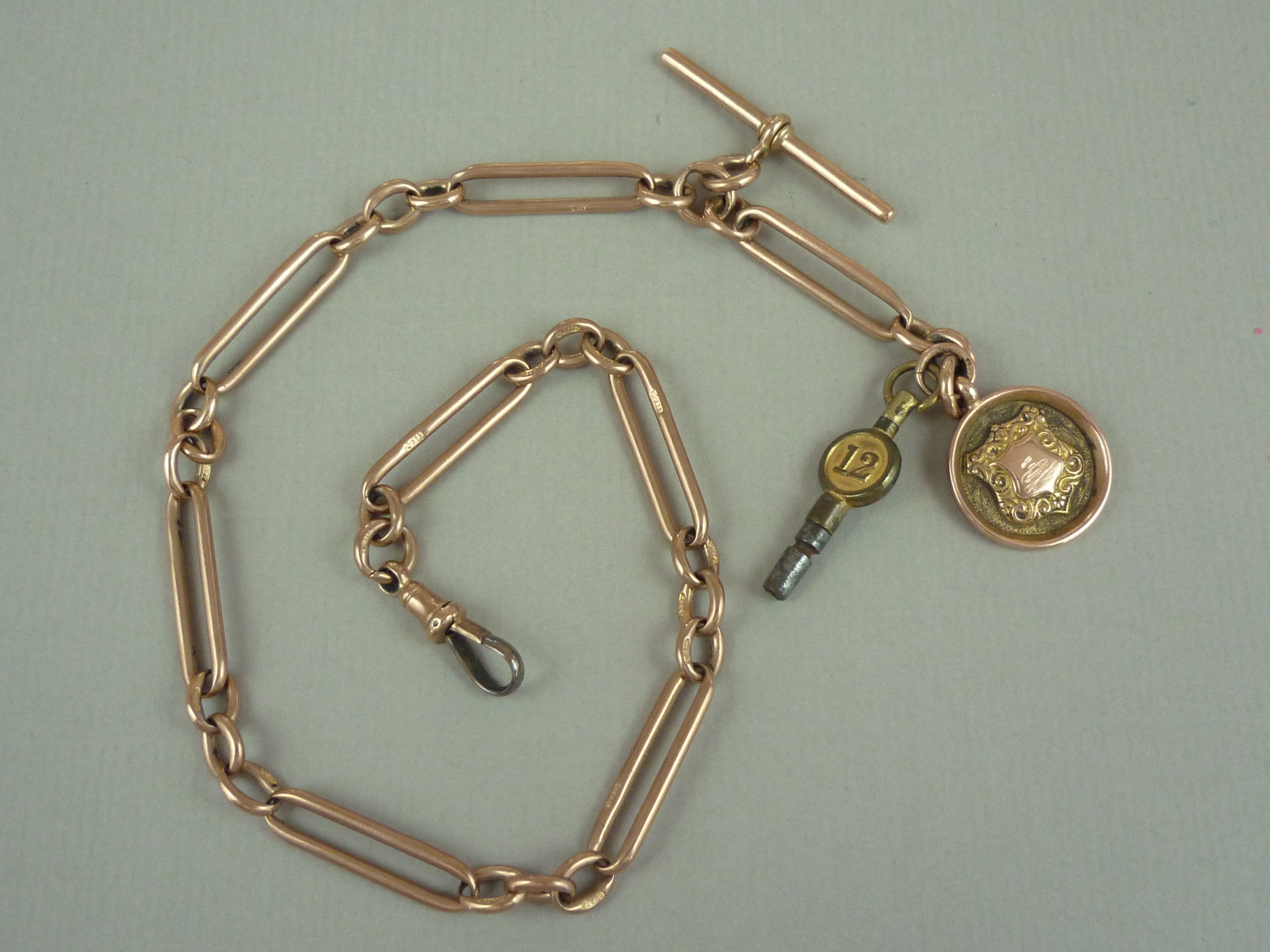 An early 20th Century gentleman's 9ct rose gold fetter link single watch chain, with 9ct gold