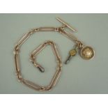 An early 20th Century gentleman's 9ct rose gold fetter link single watch chain, with 9ct gold