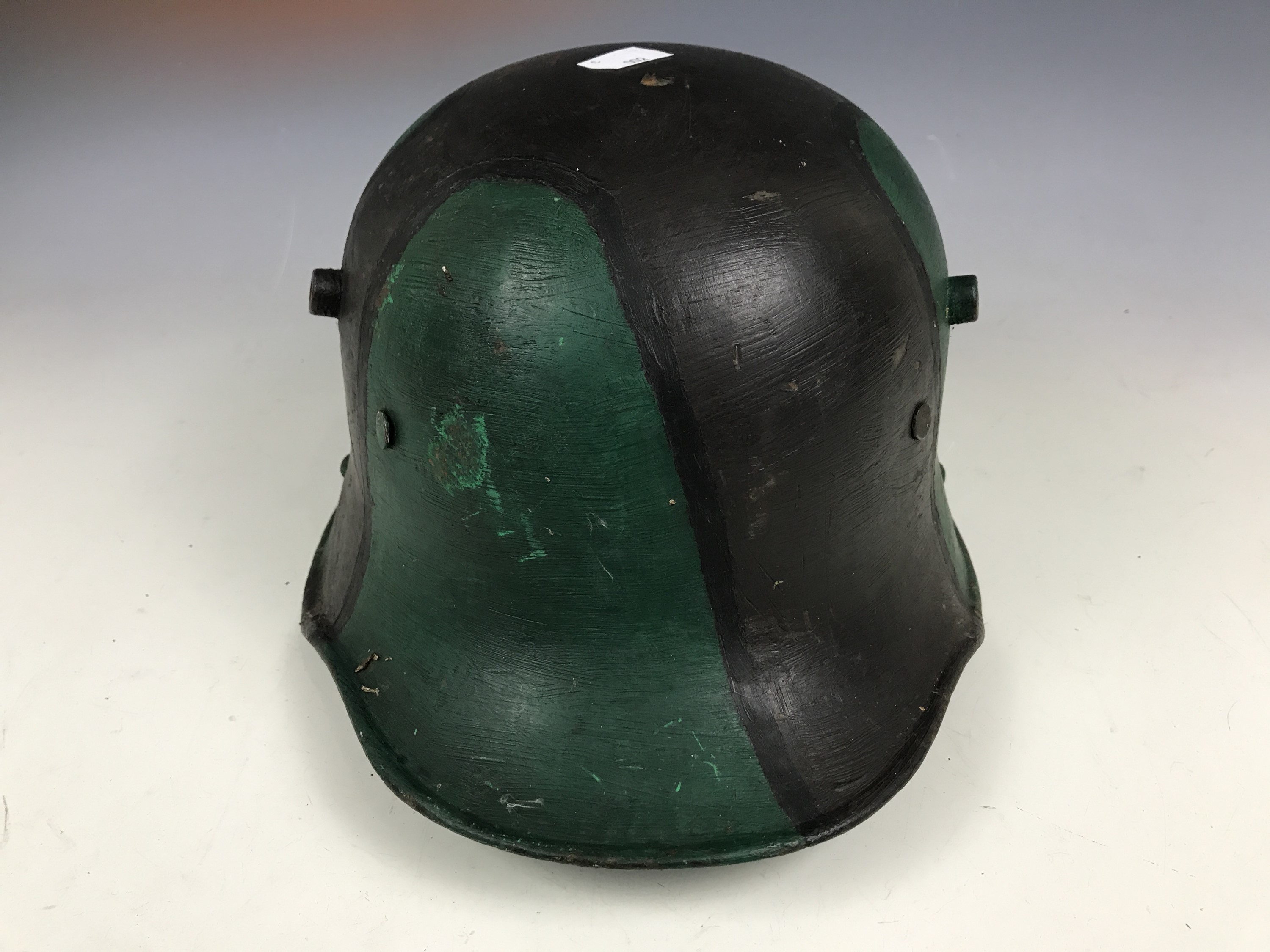 An Imperial German steel helmet, (later paint and liner)