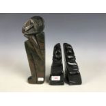 Three African stone sculptures including a pair by Mymynawa Manthenga and one other by Phineas