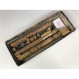 A vintage alphabet wooden printing block set