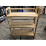 Two sets of folding display shelves