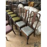 A set of four Queen Anne style mahogany dining chairs together with two others