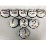 A quantity of Victorian ceramic household room bell indicators