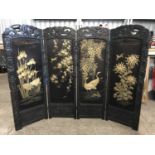 An early 20th Century Chinese folding fire screen