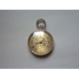 An early 20th Century lady's 9ct gold cased fob watch, with crown wound lever movement and gilt face