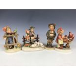 Four Hummel figurines (one a/f)