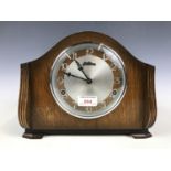 A mid 20th Century Bentima oak cased mantel clock