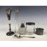 A silver trumpet vase together with silver topped toiletry jars, a silver mustard (liner a/f),