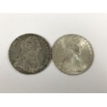 Two Maria Theresa Thaler coins