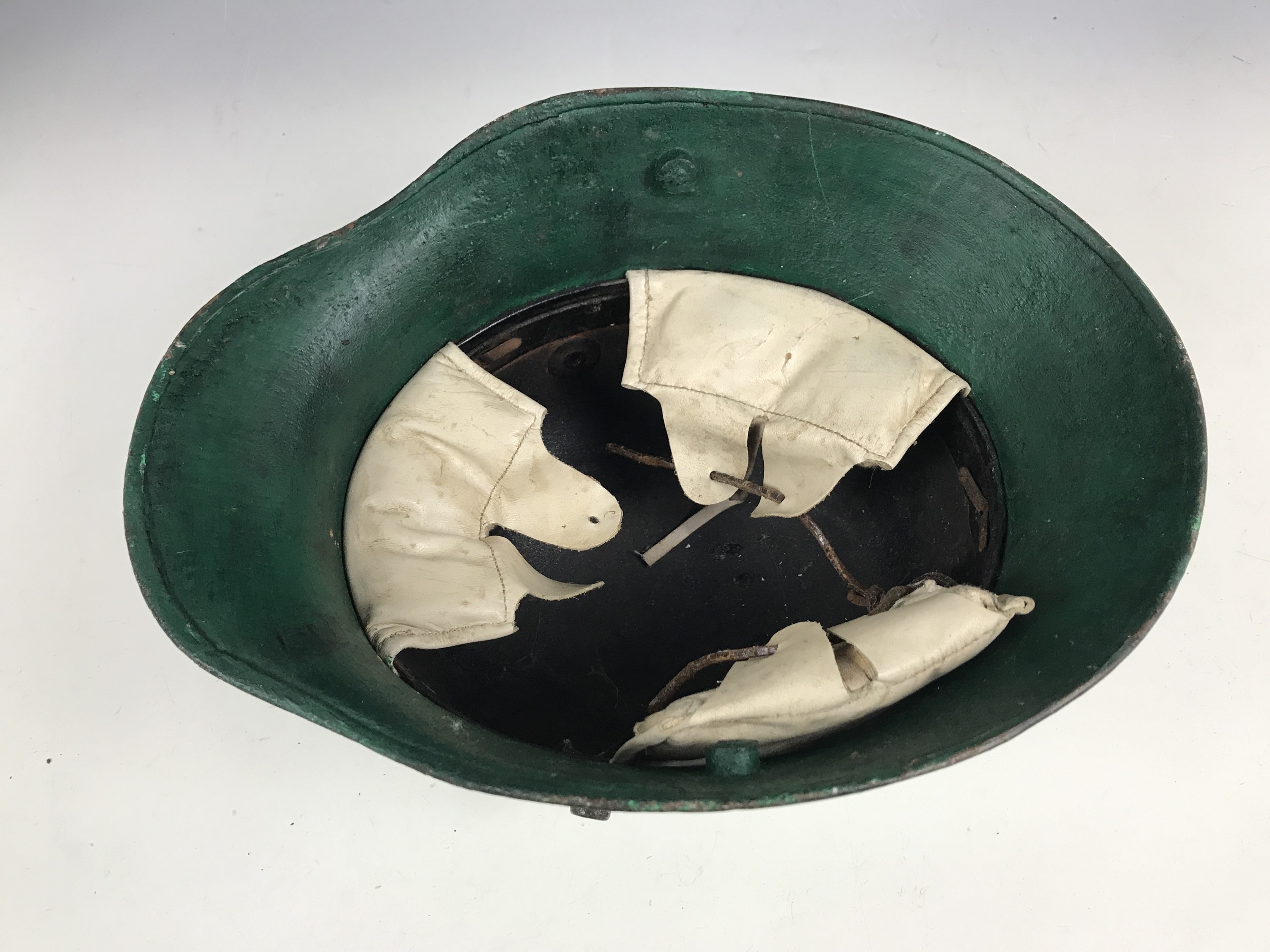 An Imperial German steel helmet, (later paint and liner) - Image 3 of 3