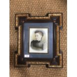 A Victorian tinted photographic portrait of a lady in fine parcel-gilt frame, 44 x 39 cm