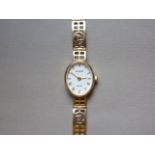 A 9ct gold cased Accurist wristwatch with quartz movement and Charles Rennie Mackintosh style 9ct