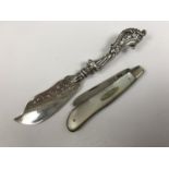 A Victorian silver butter knife and a silver pocket fruit knife