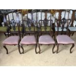 Four mahogany carved dining chairs