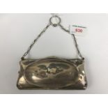 A silver ring purse