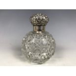 A silver mounted and cut glass grenade form perfume bottle