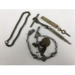 A Victorian silver fancy-link watch chain with fobs, together with a propelling pencil, T-bar and