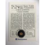 A 1 gramme 'Smallest Gold Coins of the World Collection' coin