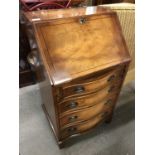 An ex Chapmans diminutive leather inlaid bureau, 53 x 44 x 95 cm