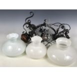 Three cast metal ceiling lights and shades