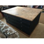 A large antique pine plan chest