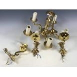 A five branch brass ceiling light together with three wall lights