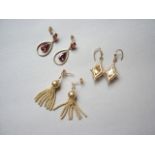 Three pairs of yellow metal pendant earrings, two pairs set with coloured stones, 8.8g total