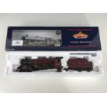 A boxed Bachmann model railway locomotive, jubilee class 5593 Kolaphur Stanier tender LMS crimson,