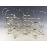 A set of four electroplate hotel ware cake stand frames