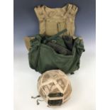 A NATO combat helmet together with body armour etc