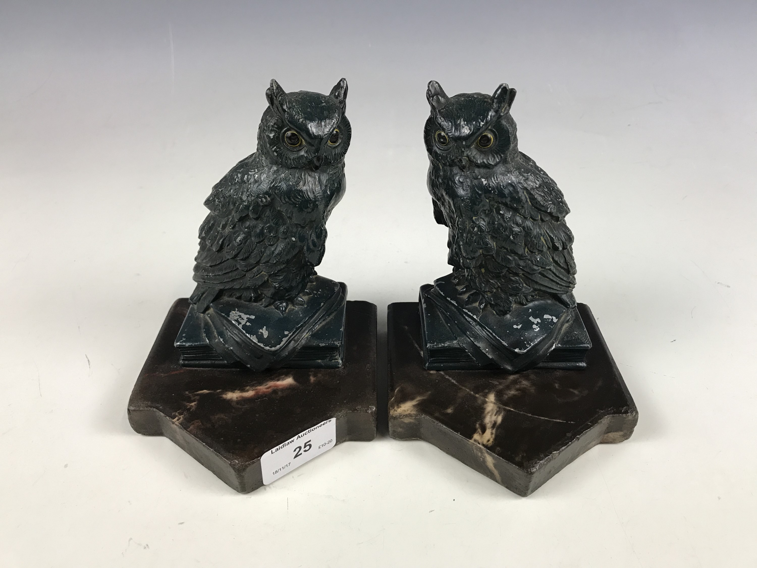 A pair of cast owl bookends