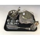 A silver sugar castor together with an electroplate basket, fish slice etc