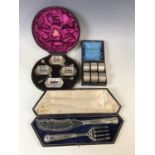 Three cased sets of vintage electroplate table ware including fish servers, salts and napkin rings